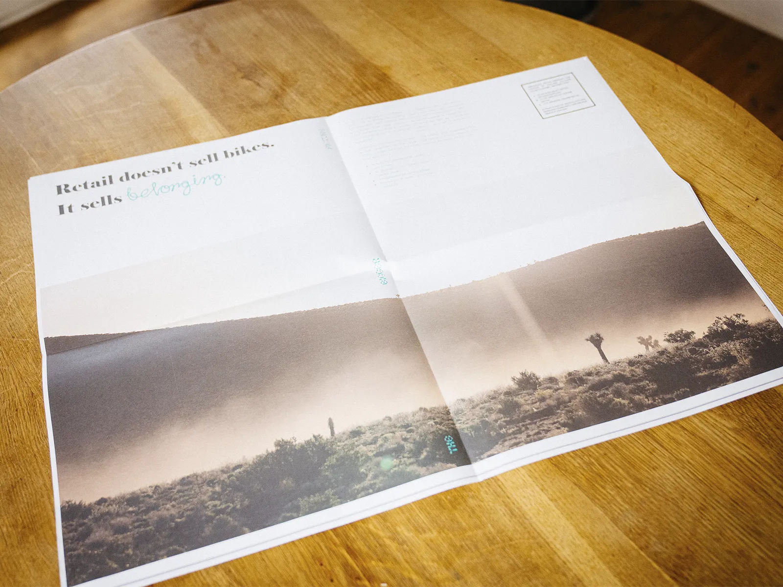 Unroads editorial spread with desert landscape and headline about retail and belonging