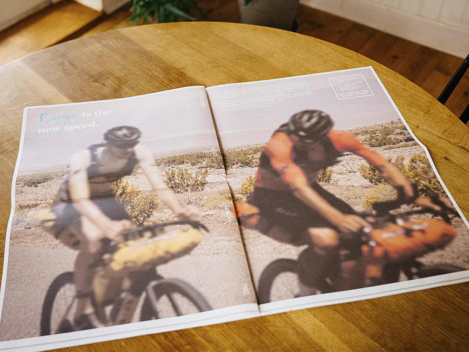 Unroads editorial spread showing bikepacking riders in motion across a desert landscape