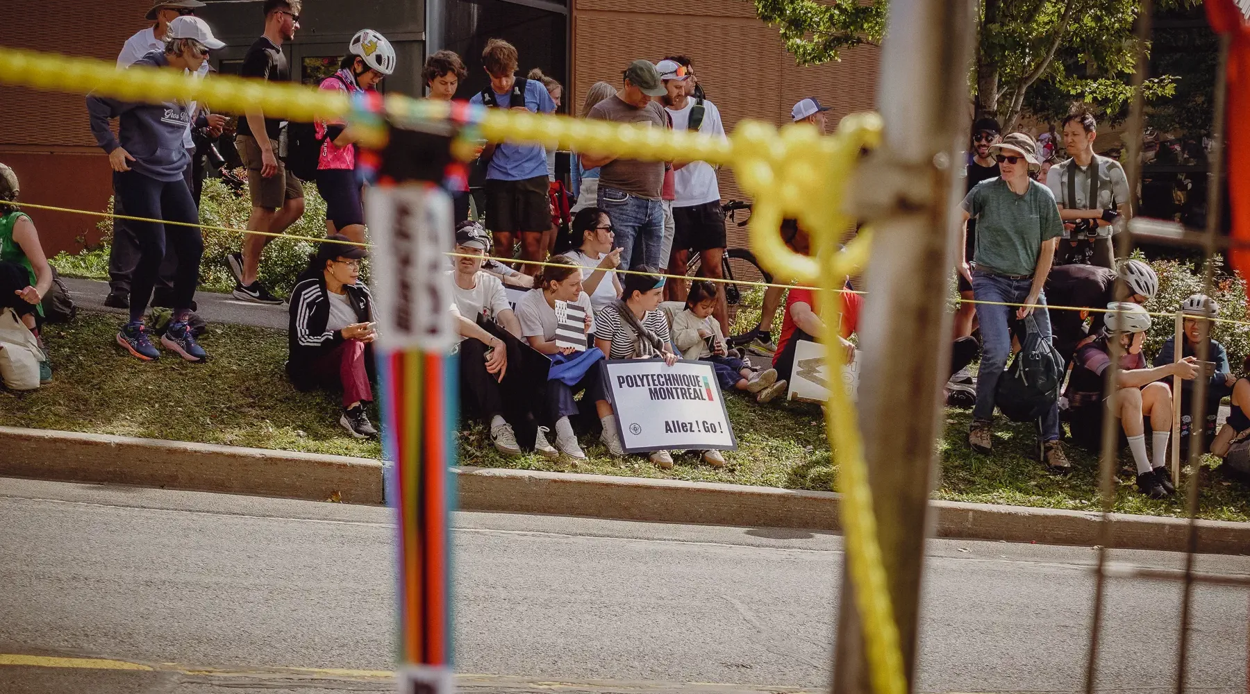 Course-side posts and race furniture frame the crowd in a layered, graphic Mount Royal race-day detail