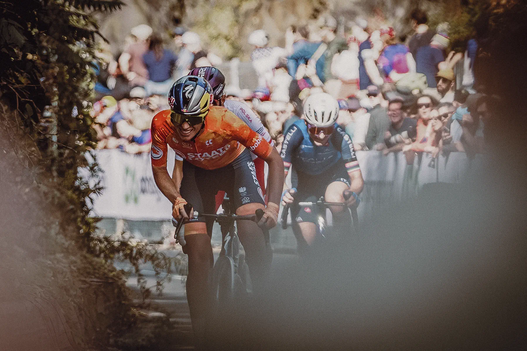 A Netherlands rider drives the pace with the chase group blurred behind on Mount Royal