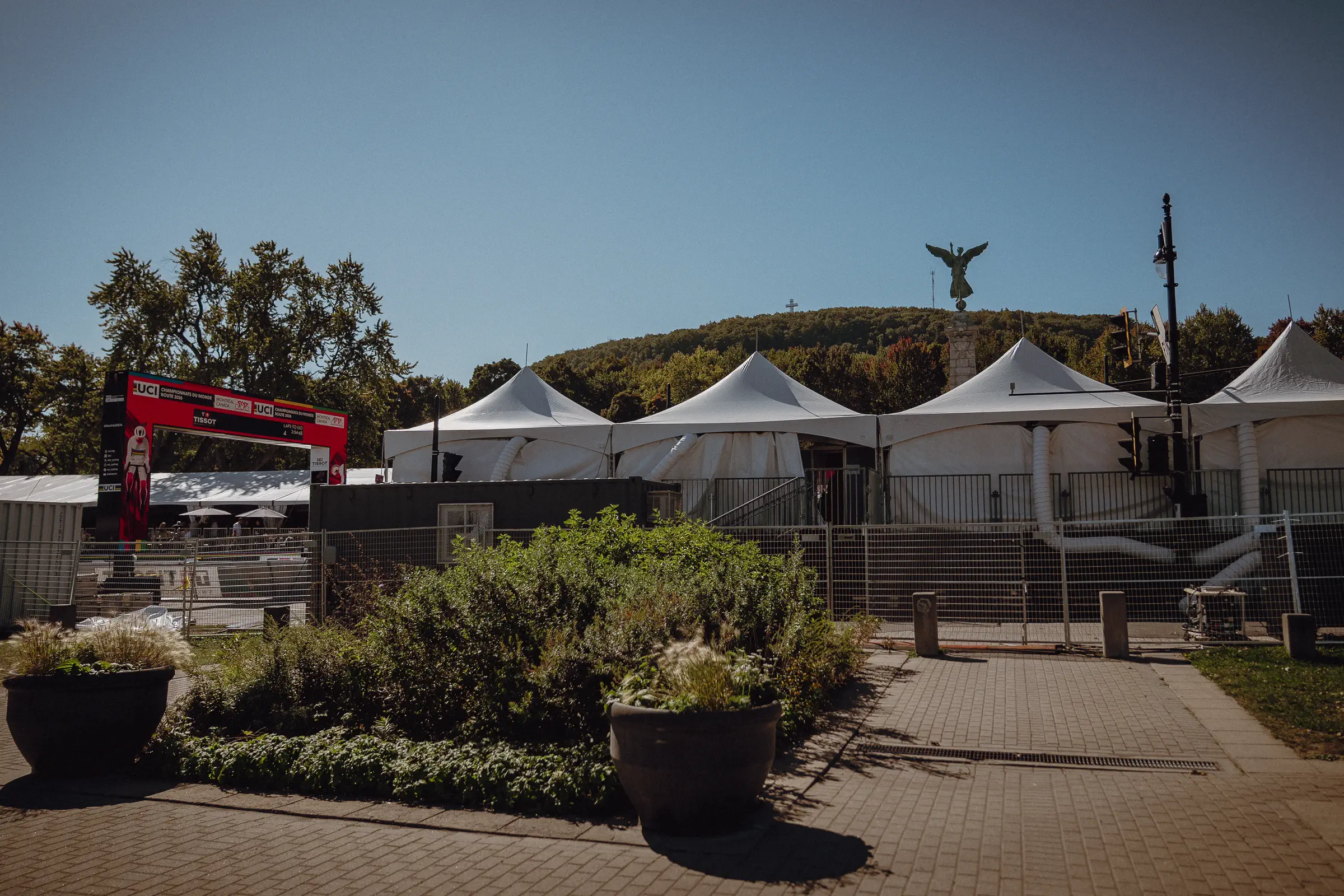 Temporary tents and course infrastructure settle into the green spaces around Mount Royal